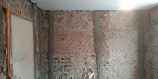 Fotografia: Kancelária požičovne a príručné priestory kuchyne pri kultúrnom dome - rekonštrukcia