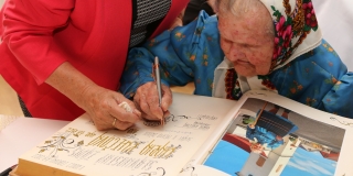 Fotografia: Prijatie 100. ročnej jubilantky - Márie Kmečovej, rod. Jančiovej (foto Patrícia Žembová)